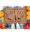 Black Cats Guard This Home